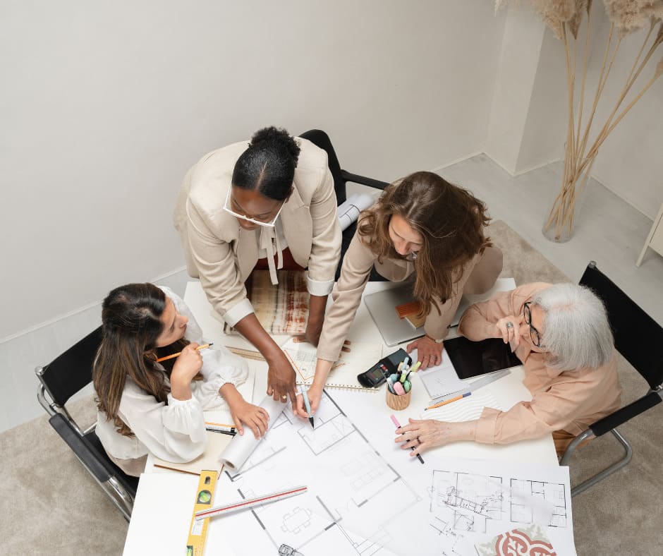 Women brainstorming around a table