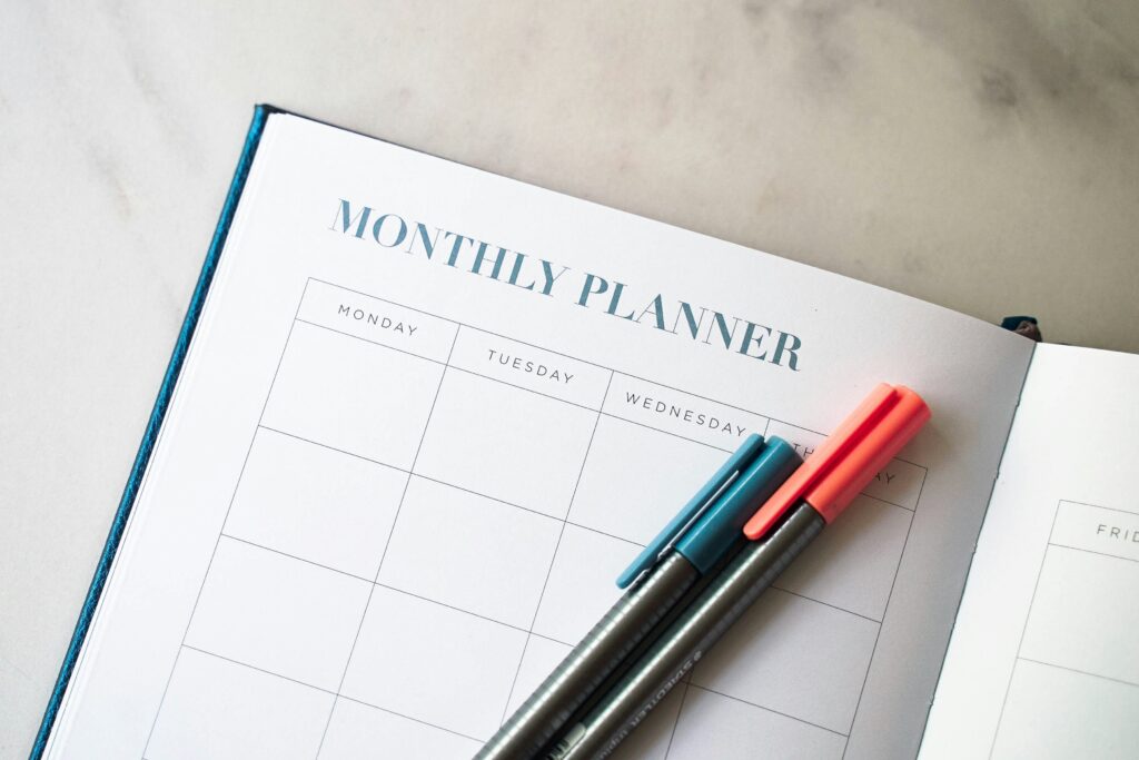 a planner on a desk with a pencil getting ready to plan for Women CEO membership