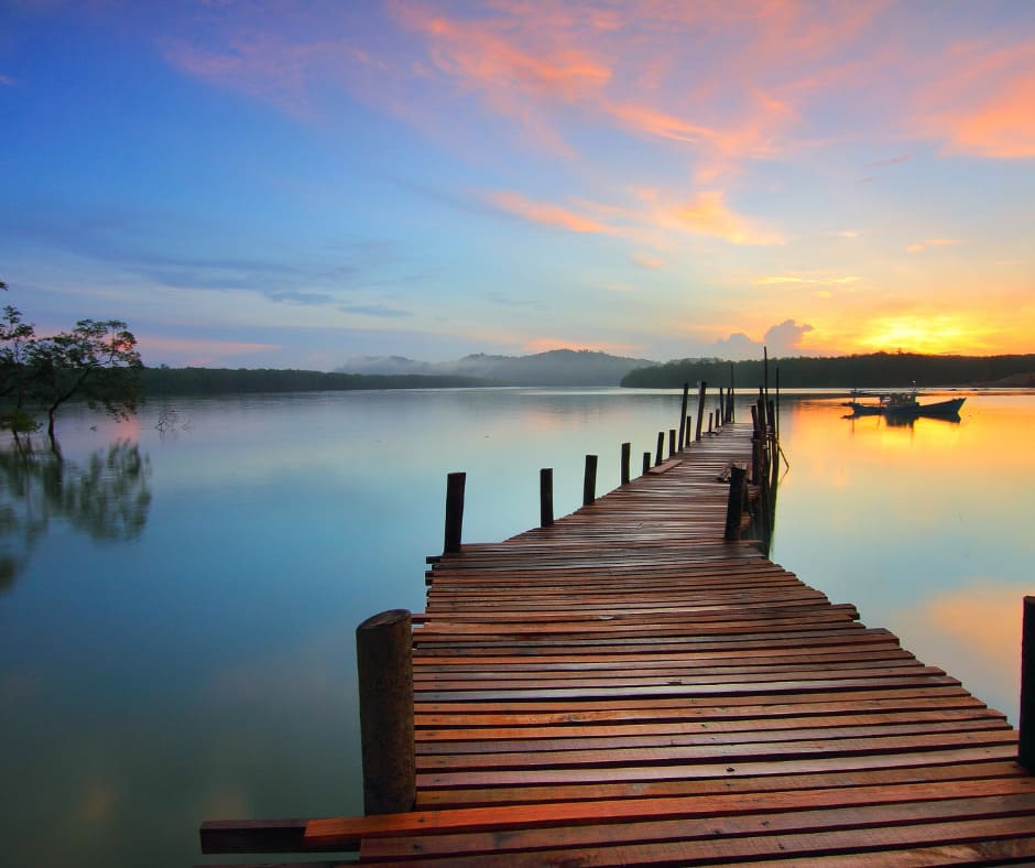 view of a wooden dock overlooking a lake